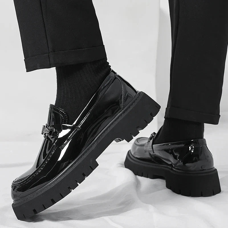 Magnus Black patent loafers worn with black socks - side angle