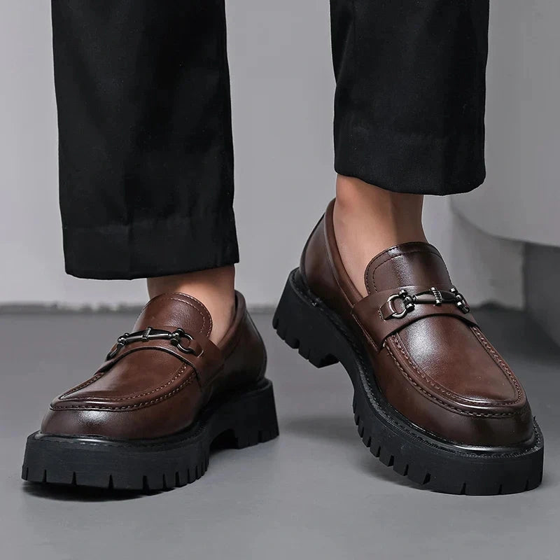 Magnus Brown loafers worn with black trousers - front pair