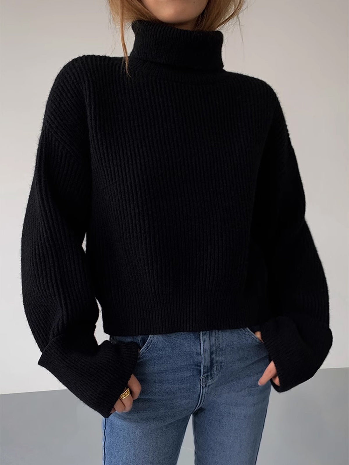 black-turtleneck sweater