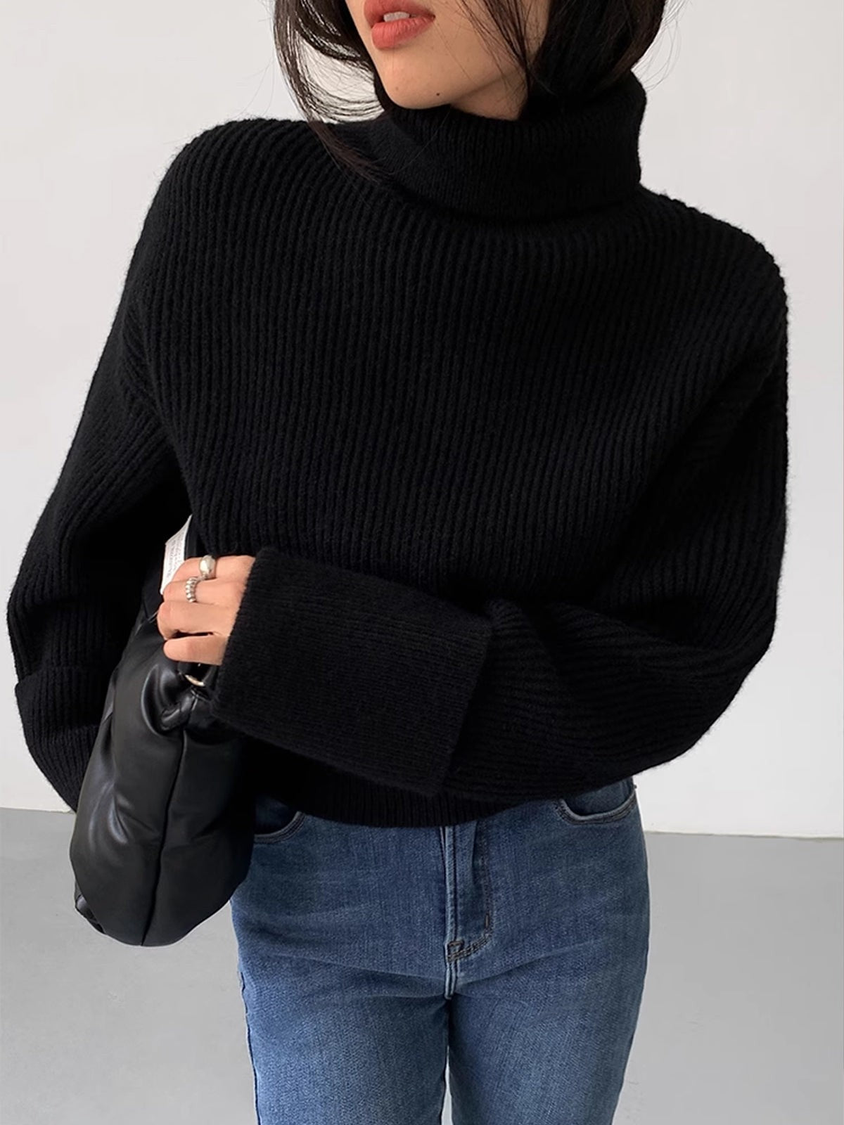 black-turtleneck sweater