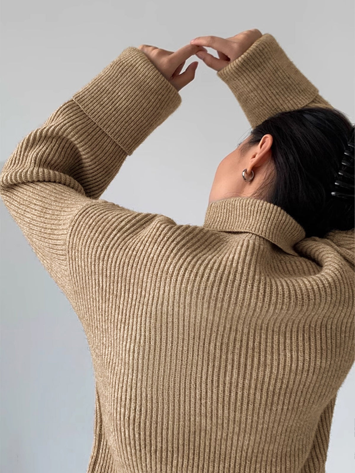 khaki-turtleneck sweater